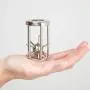 Bits and Pieces - Trapped Satellite Metal Brainteaser Puzzle - Metal Spiked Ball in Steel Chamber - Brainteaser Puzzle Measures 3'' x 1''