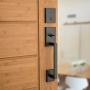 Kwikset 98180-020 San Clemente Single Cylinder Low Profile Front Lock Handleset with Halifax Door Handle Lever Featuring SmartKey Security, Iron Black