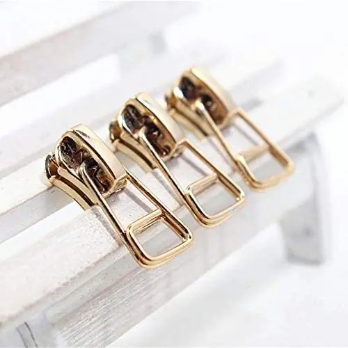 TAYARA 5 Pcs # 5 Zipper Slider Pull Fashion Metal Repair Universal Replacement Bulk Sewing Lobby Corset Clothes Bag Jackets Tents Luggage Sleeping for DIY Clothing Tailor (Gold Light) TAYARA 5 Pcs # 5 Zipper Slider Pull Fashion Metal Repair Universal Replacement Bulk Sewing Lobby Corset Clothes Bag Jackets Tents Luggage Sleeping for DIY Clothing Tailor (Gold Light)