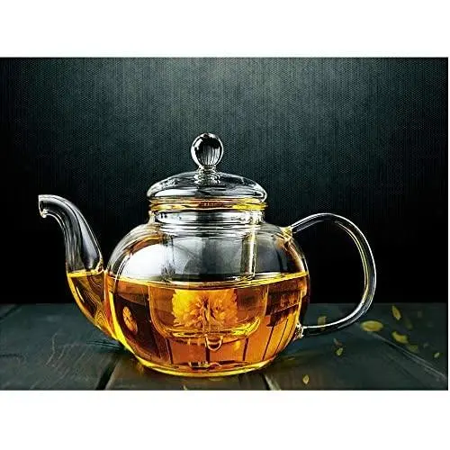 Suns Tea 32oz (950 ml) Ultra Clear | Lead-free | No Metal or Plastic Parts | Borosilicate Glass Teapot & See-thru Glass Infuser - For Loose Tea, Bagged and Flowering Teas Suns Tea 32oz (950 ml) Ultra Clear | Lead-free | No Metal or Plastic Parts | Borosilicate Glass Teapot & See-thru Glass Infuser - For Loose Tea, Bagged and Flowering Teas
