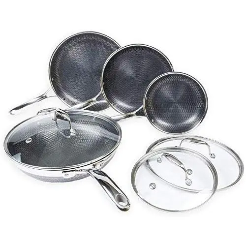 HexClad Hybrid Non-Stick Cookware | 7 Piece Set with Lids and Wok | Metal Utensil Safe, Induction Ready & PFOA-Free | Non-Stick & Stainless Steal Construction HexClad Hybrid Non-Stick Cookware | 7 Piece Set with Lids and Wok | Metal Utensil Safe, Induction Ready & PFOA-Free | Non-Stick & Stainless Steal Construction