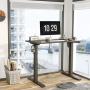 FEZIBO Height Adjustable Electric Standing Desk, 40 x 24 Inches Stand Up Table, Sit Stand Home Office Desk with Splice Board, Black Frame/Black Top