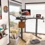 FEZIBO L-Shaped Electric Standing Desk, 48 Inches Height Adjustable Corner Desk, Full Sit Stand Home Office Table with Splice Board, Black Frame/Black Top