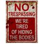 Rockland Guard - No Trespassing Were Tired of Hiding The Bodies Metal Sign