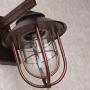 Jiuzhuo Industrial 1-Light Metal Cage Clear Glass Shaded Nautical Outdoor Wall Light in Antique Copper