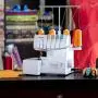 Brother 1034D Serger, Heavy-Duty Metal Frame Overlock Machine, 1,300 Stitches Per Minute, Removeable Trim Trap, 3 Included Accessory Feet Brother 1034D Serger, Heavy-Duty Metal Frame Overlock Machine, 1,300 Stitches Per Minute, Removeable Trim Trap, 3 Included Accessory Feet