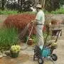 Liberty Garden 301 Never Flat 2-Wheel Decorative Garden Hose Reel Cart, Holds-200-Feet of 5/8-Inch Hose - Bronze